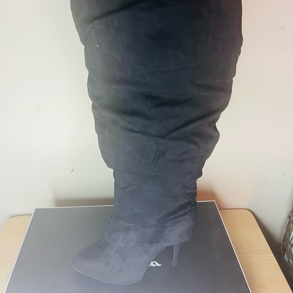Black, ruched, knee length boots